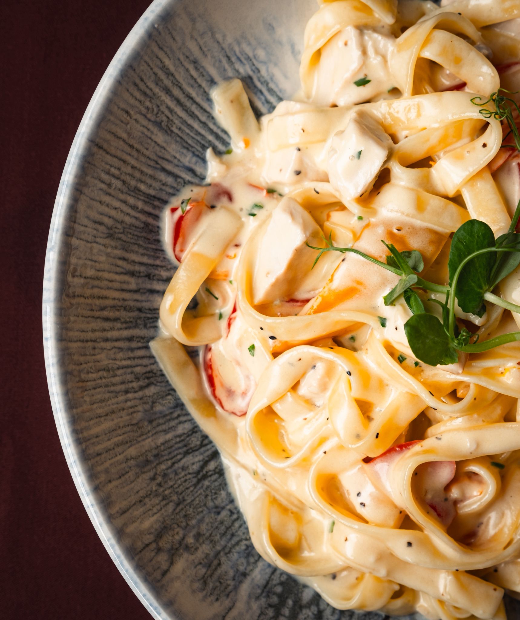 Roasted peppers, chicken, white wine, cream and parmesan